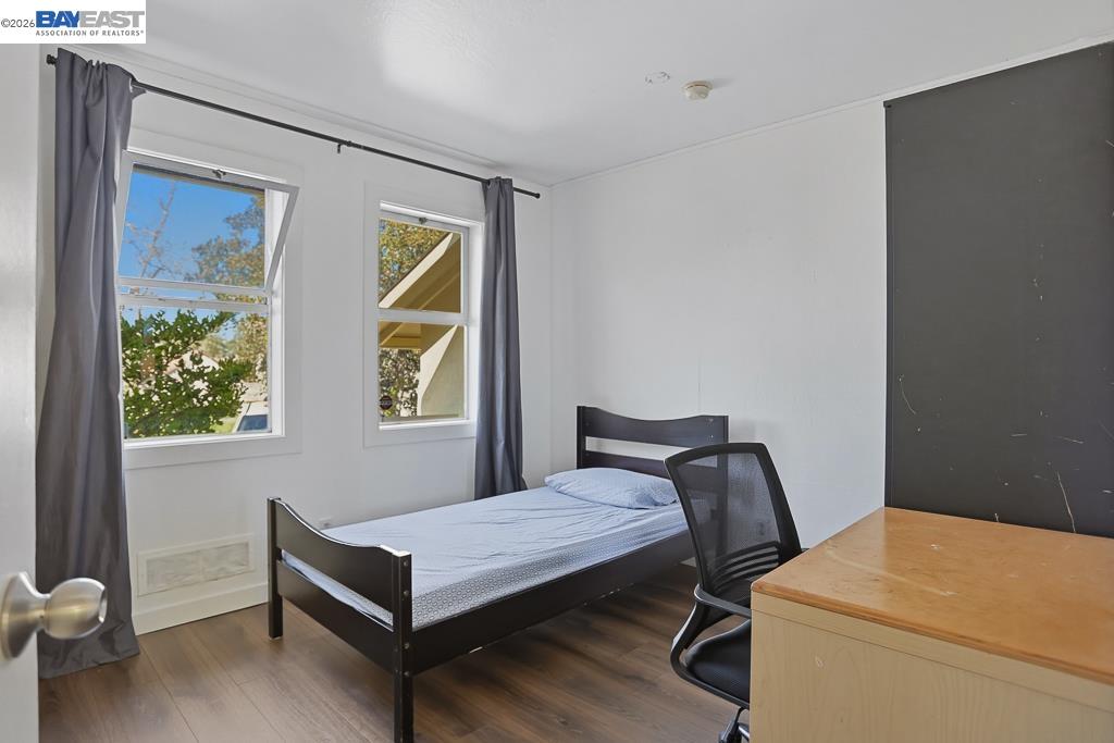 179 Los Ranchitos Road San Rafael, CA 94903 - Photo 15 of 38 a bedroom with a bed and a window