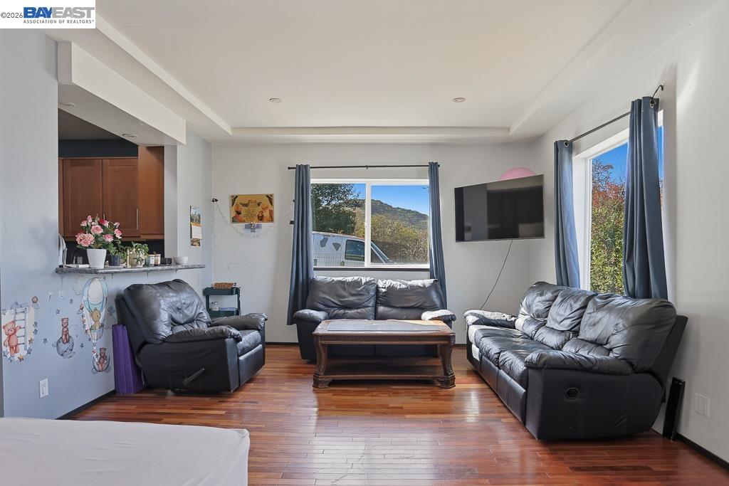 179 Los Ranchitos Road San Rafael, CA 94903 - Photo 17 of 38 a living room with furniture and a large window