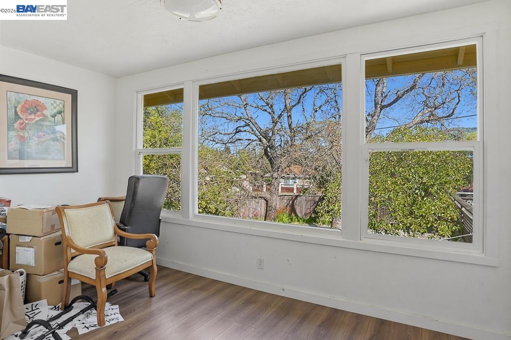 179 Los Ranchitos Road San Rafael, CA 94903 - Photo 7 of 38 a view of a livingroom with furniture and a painting on the wall