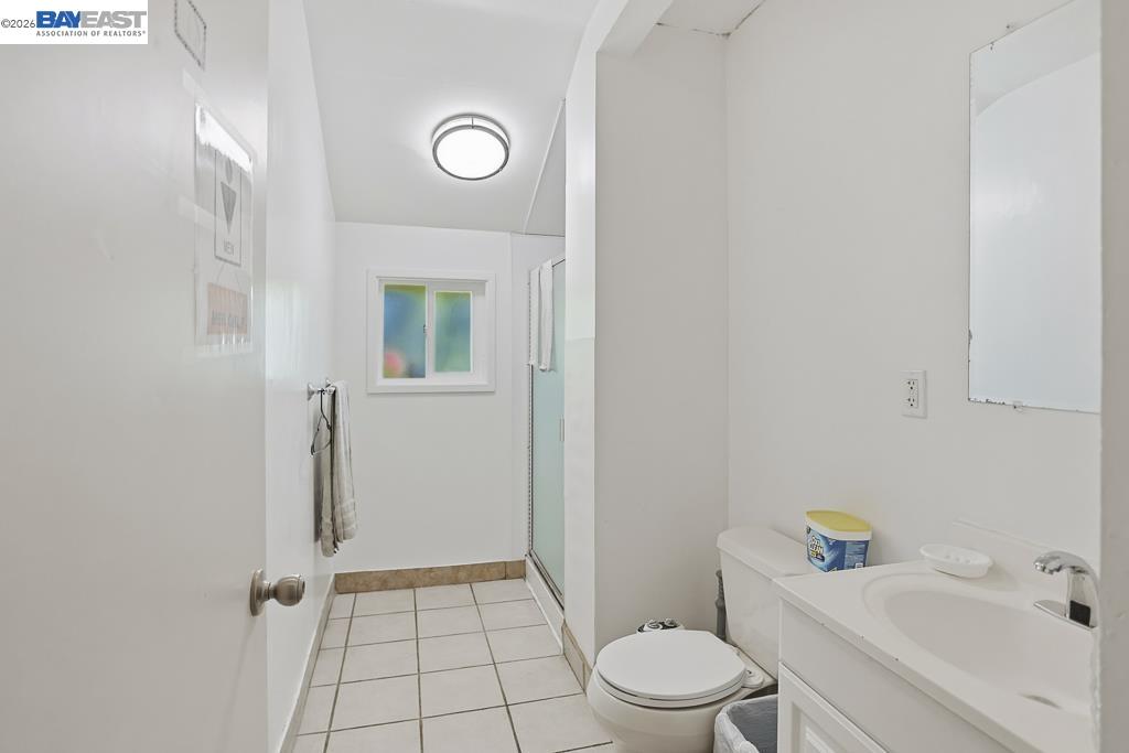 179 Los Ranchitos Road San Rafael, CA 94903 - Photo 10 of 38 a bathroom with a sink a toilet and shower