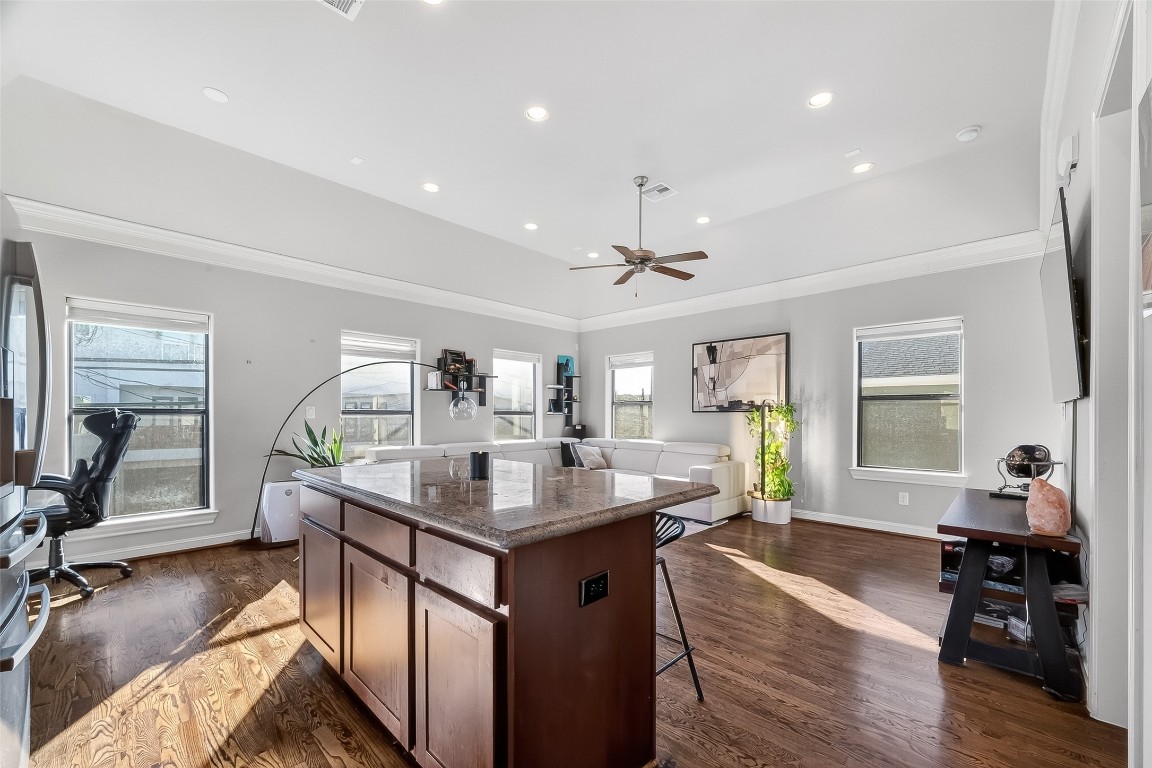 605 Meadow Street Houston, TX 77020 - Photo 12 of 31 a very nice looking living room with wooden floor and furniture