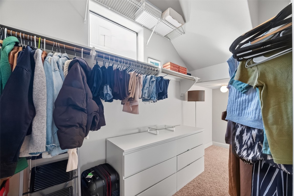 605 Meadow Street Houston, TX 77020 - Photo 18 of 31 a view of walk in closet with clothes and shoes
