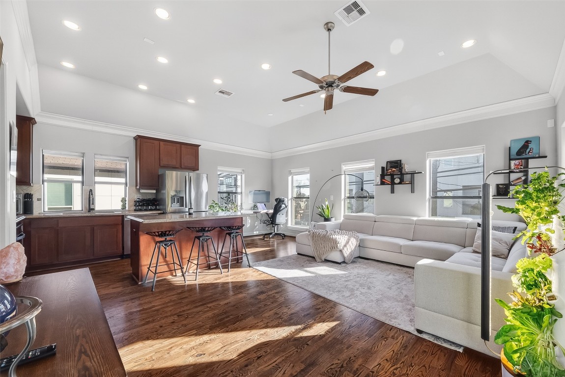 605 Meadow Street Houston, TX 77020 - Photo 2 of 31 a living room with furniture and a wooden floor