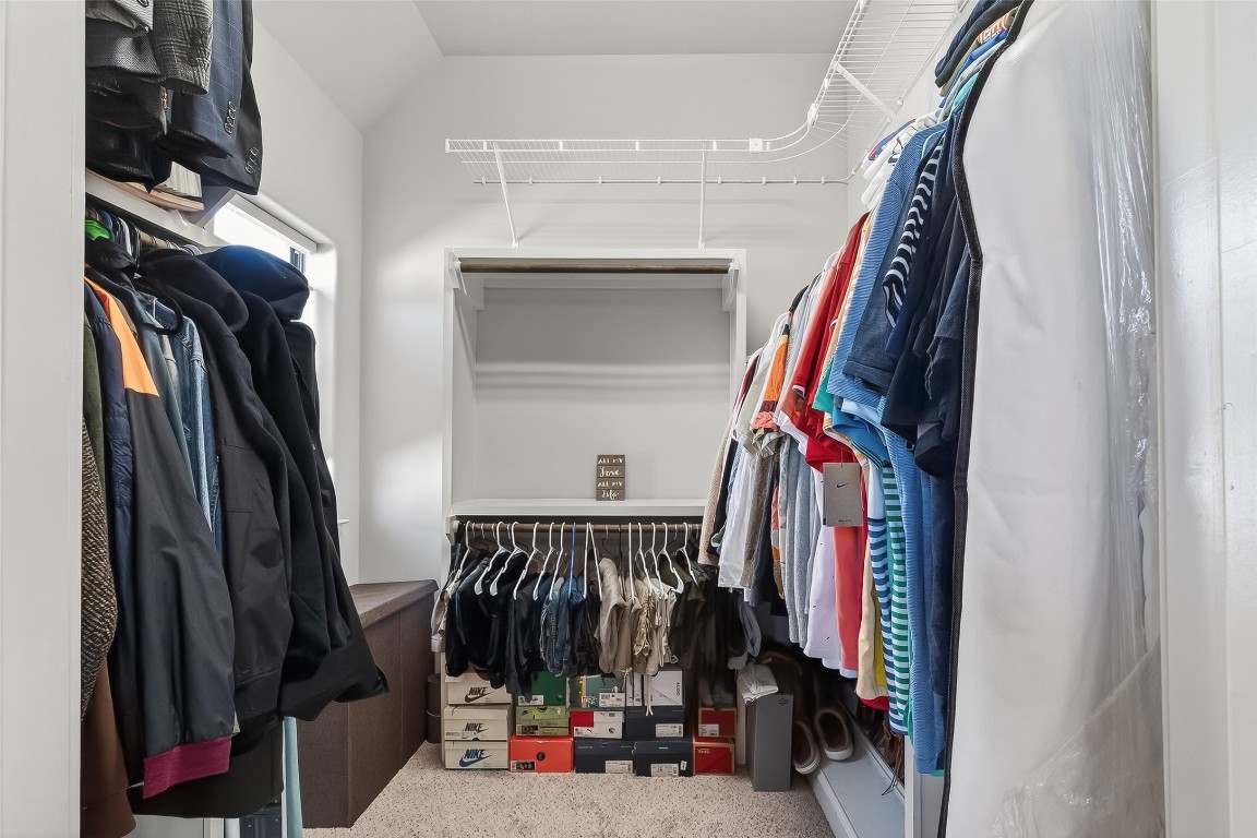 605 Meadow Street Houston, TX 77020 - Photo 22 of 31 a view of walk in closet with clothes and shoes