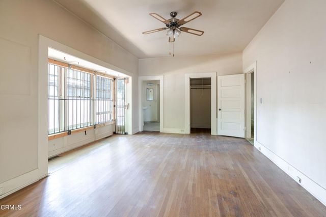 a bathroom with a sink bathtub and a window