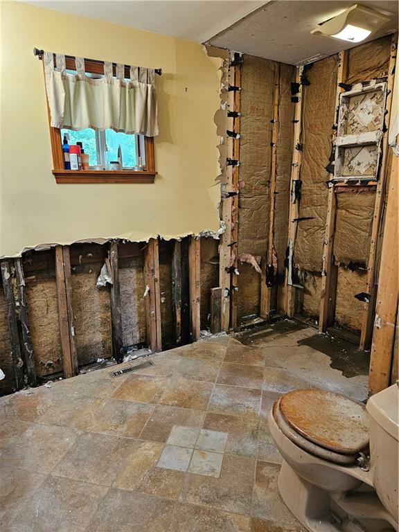 2945 Hills Church Road Export, PA 15632 - Photo 14 of 24 a bathroom with a granite countertop sink a toilet and a shower