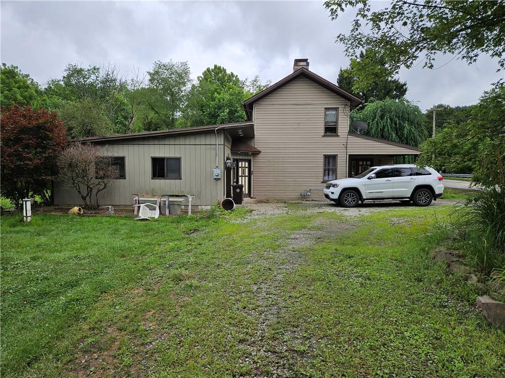 2945 Hills Church Road Export, PA 15632 - Photo 3 of 24 a view of front of a house with a yard