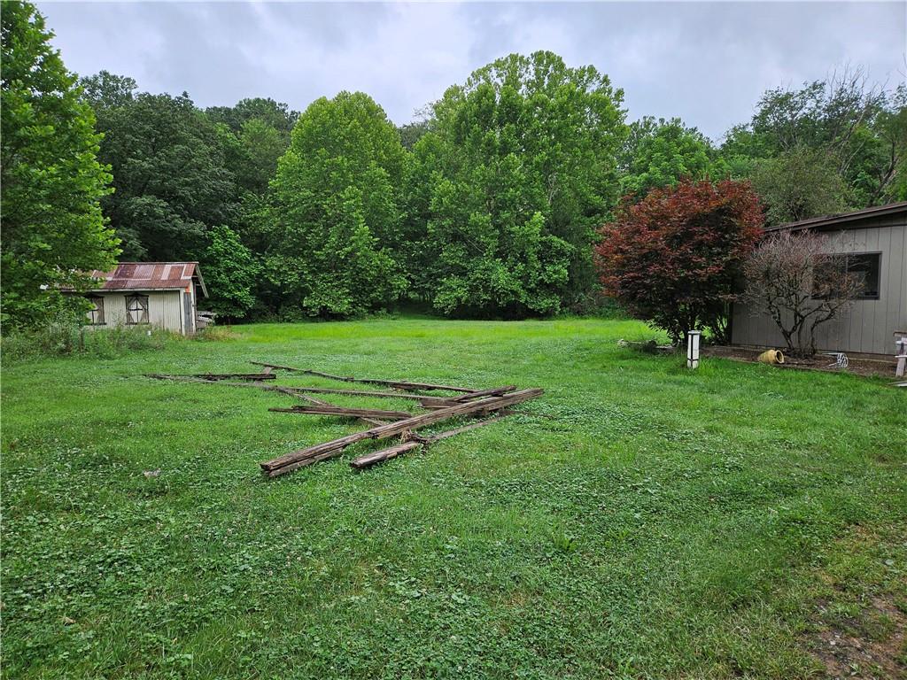 2945 Hills Church Road Export, PA 15632 - Photo 6 of 24 a green field with lots of trees in it