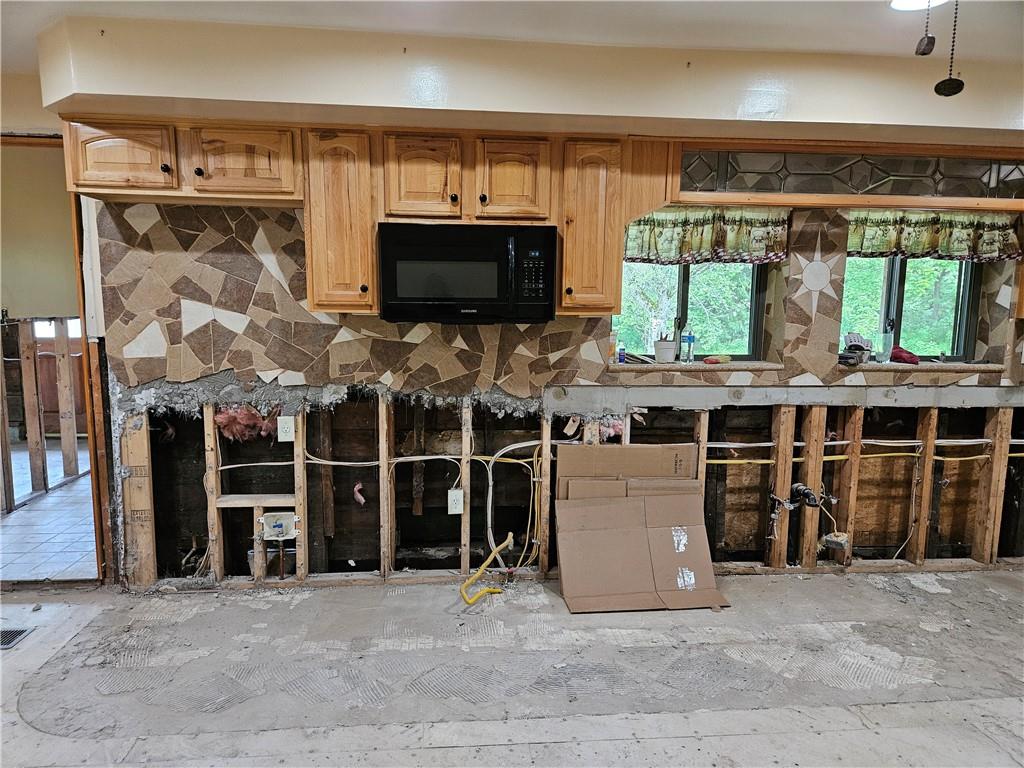 2945 Hills Church Road Export, PA 15632 - Photo 8 of 24 a view of a room with racks on the wall