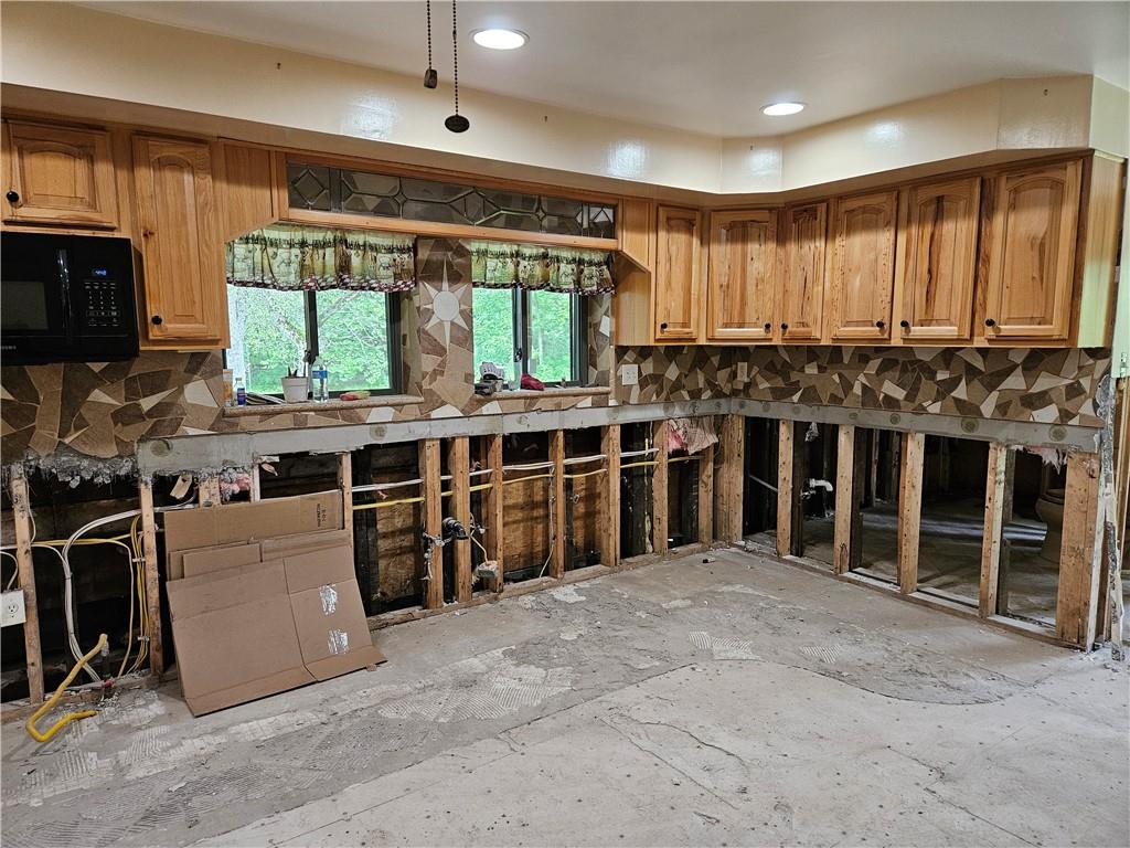 2945 Hills Church Road Export, PA 15632 - Photo 9 of 24 a view of a kitchen with windows