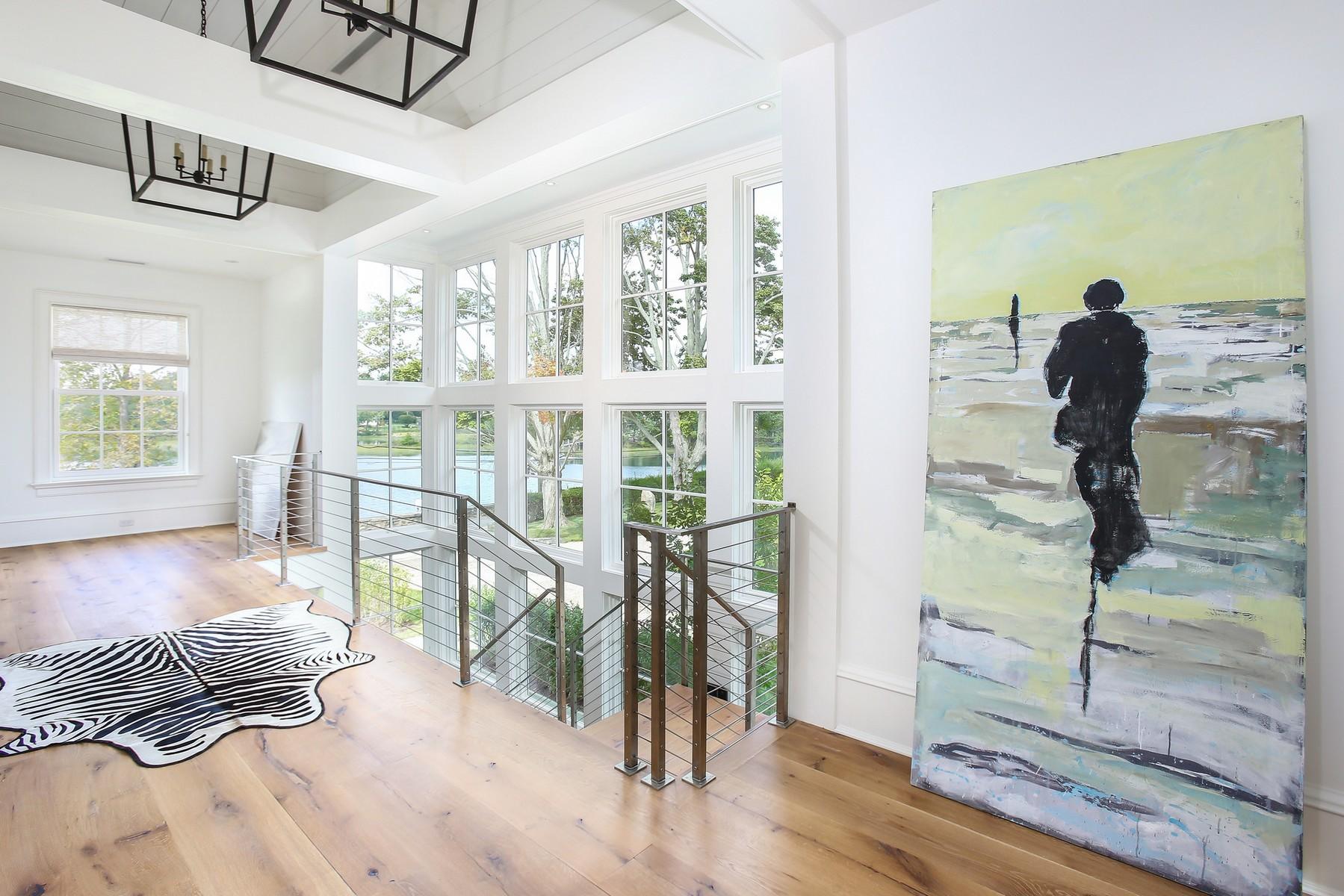 106 Pear Tree Point Road Darien, CT 06820 - Photo 18 of 43 a view of entryway with wooden floor