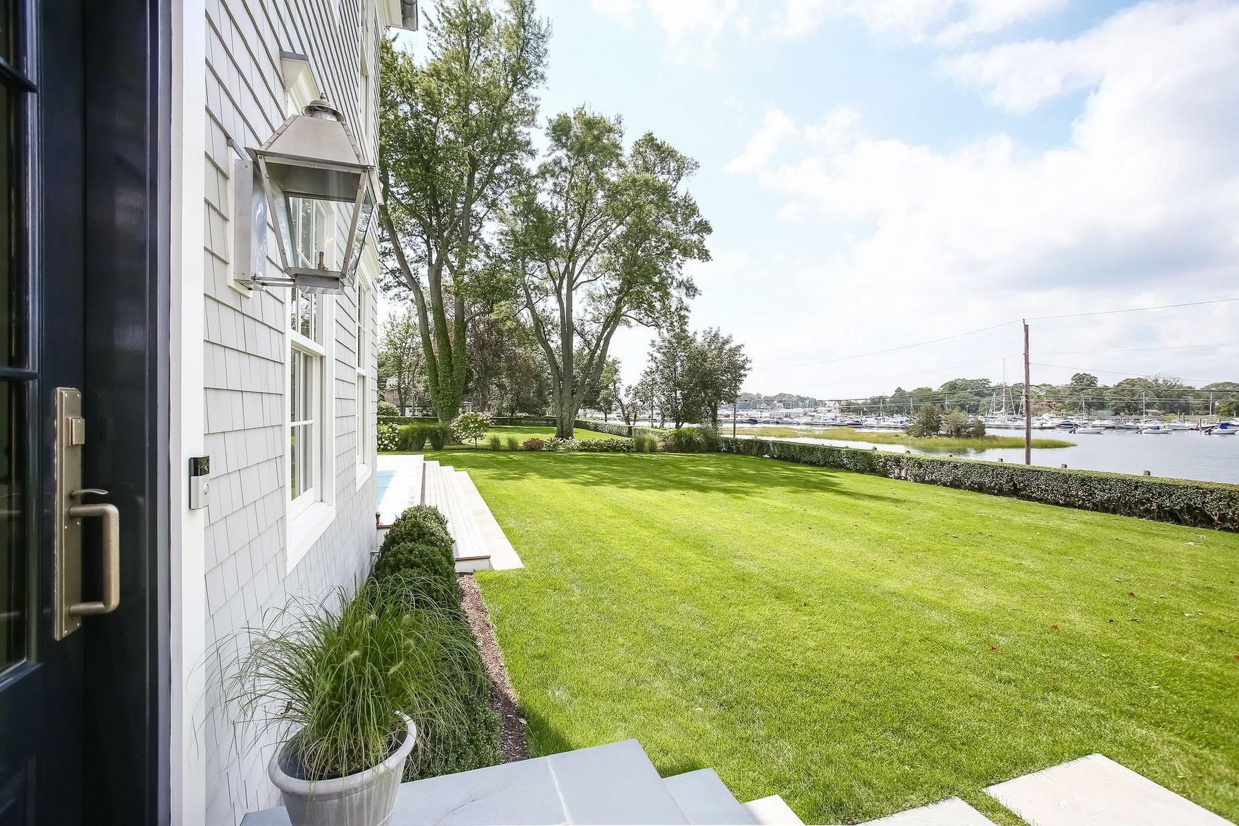 106 Pear Tree Point Road Darien, CT 06820 - Photo 36 of 43 a view of a swimming pool with a yard