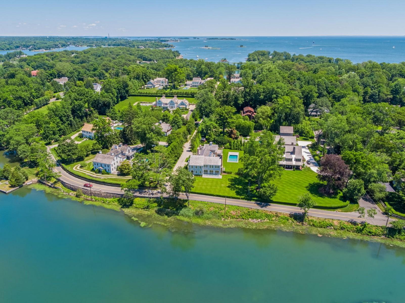 106 Pear Tree Point Road Darien, CT 06820 - Photo 39 of 43 an aerial view of a house with a garden