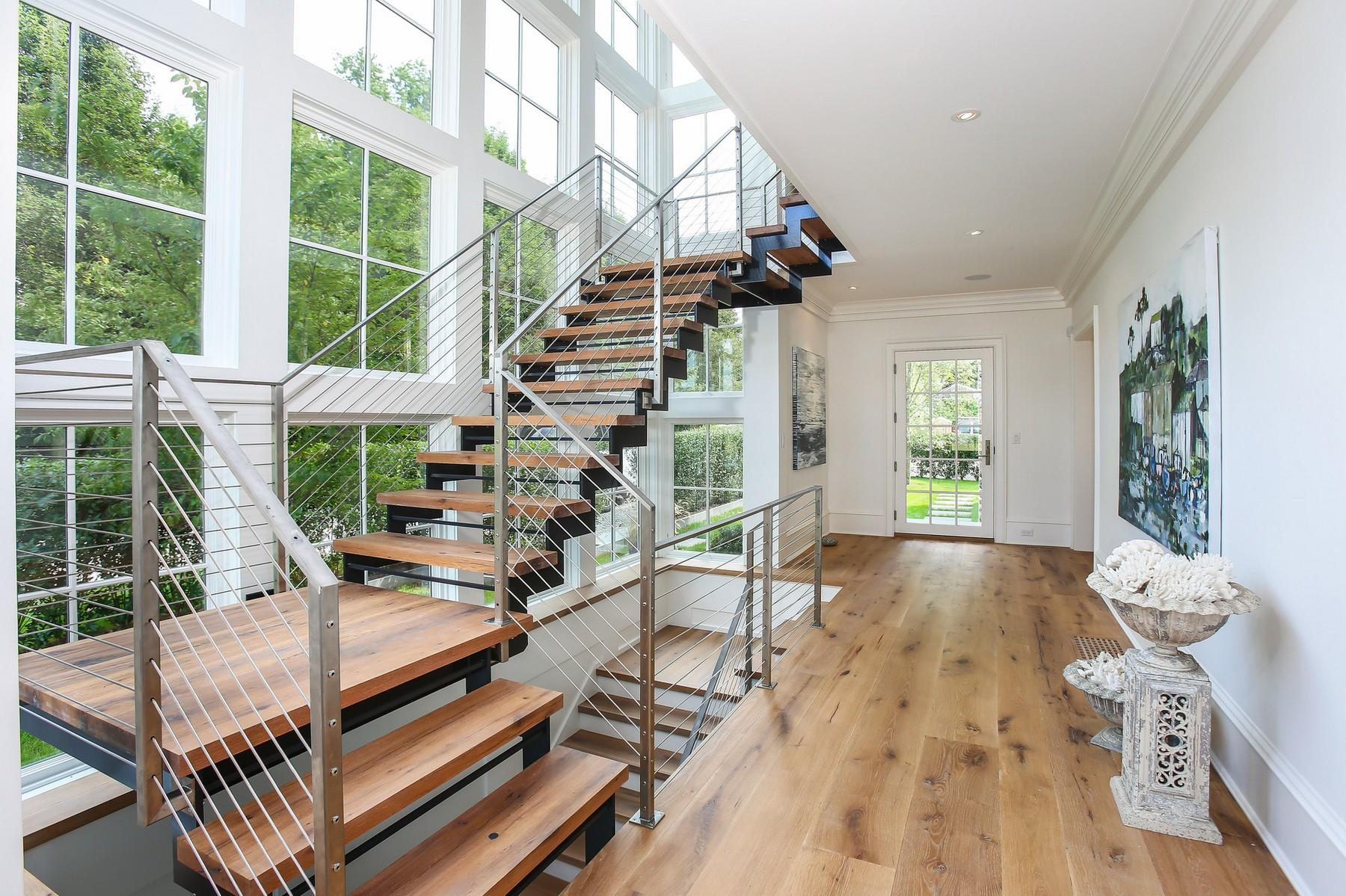 106 Pear Tree Point Road Darien, CT 06820 - Photo 5 of 43 a view of entryway and hall with wooden floor