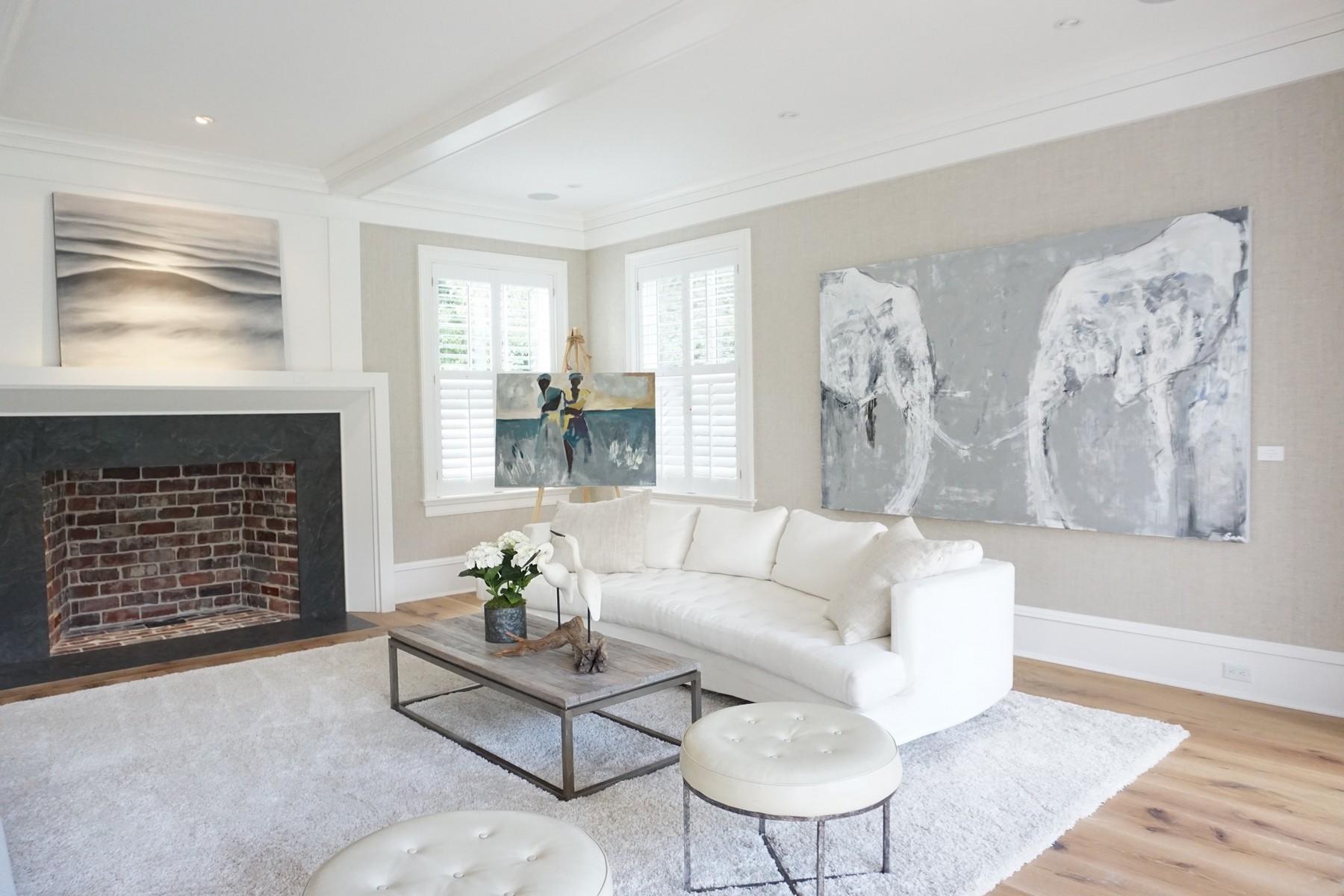 106 Pear Tree Point Road Darien, CT 06820 - Photo 6 of 43 a living room with furniture and a fireplace