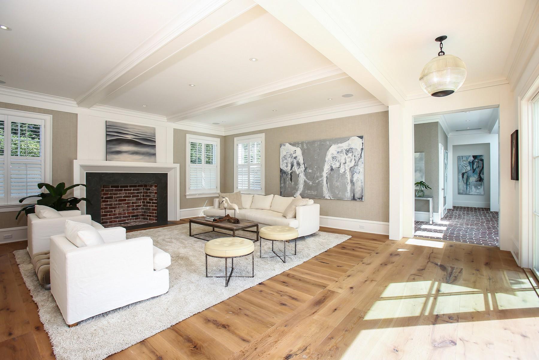 106 Pear Tree Point Road Darien, CT 06820 - Photo 7 of 43 a living room with furniture large window and a fireplace