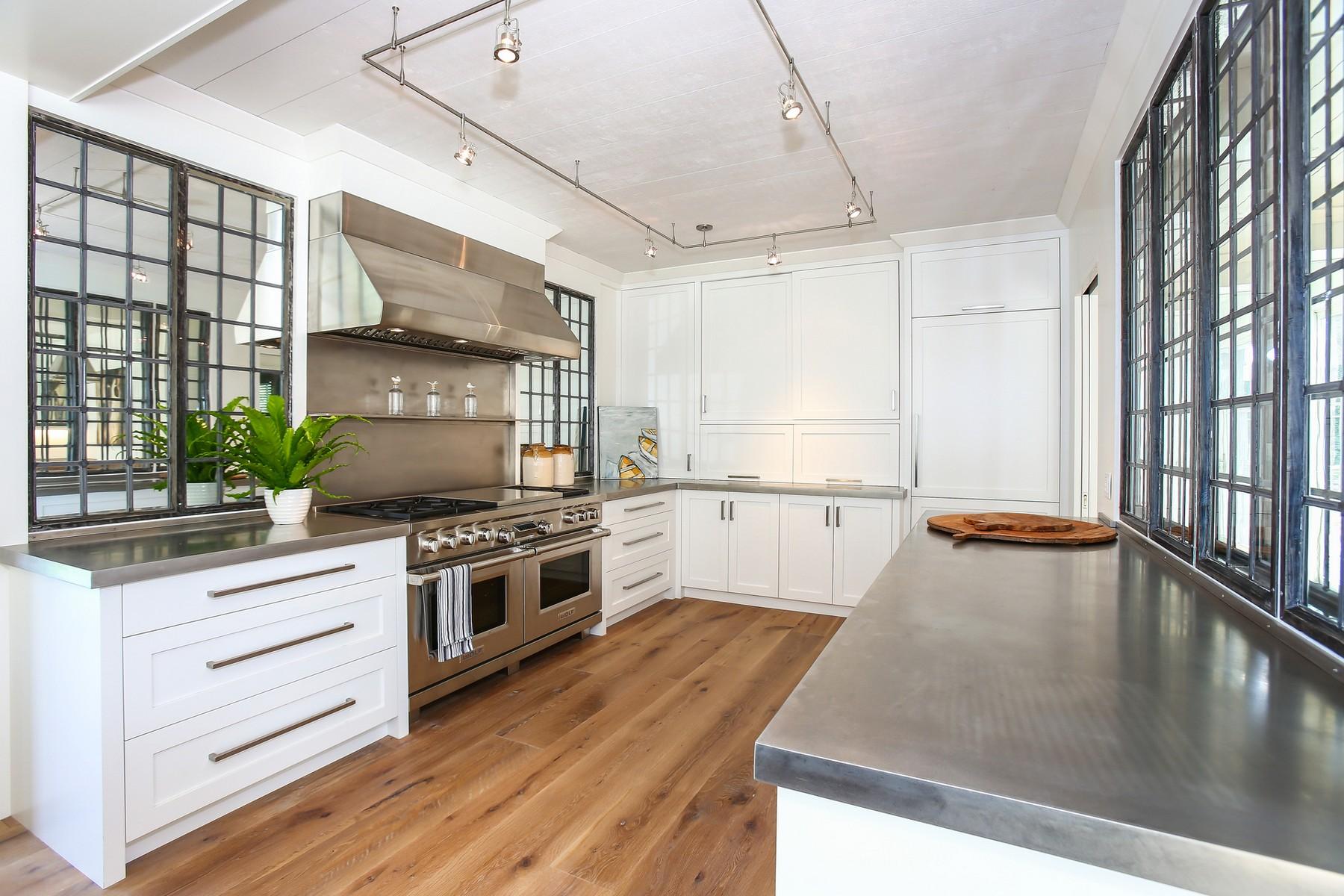 106 Pear Tree Point Road Darien, CT 06820 - Photo 8 of 43 a kitchen with stainless steel appliances granite countertop a stove and a sink