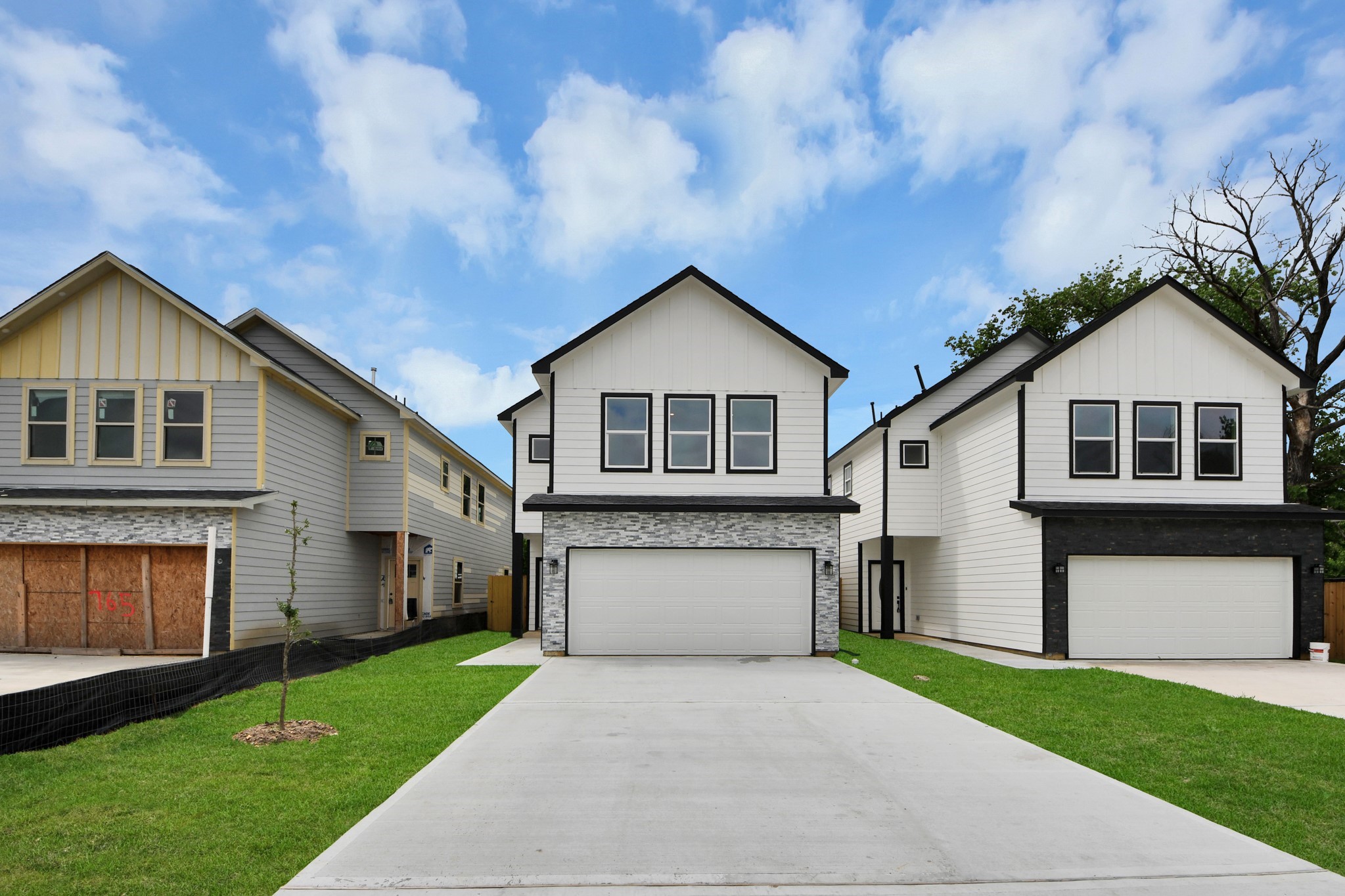767 Marjorie Street Houston, TX 77088 - Photo 3 of 20 a front view of a house with a garden and yard