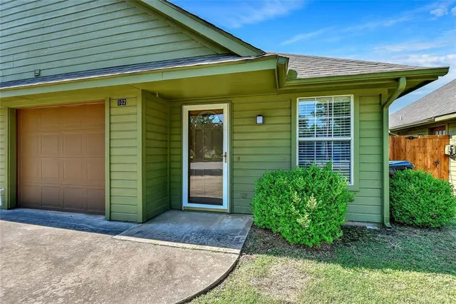 a house view with a outdoor space