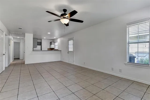 an empty room with fan