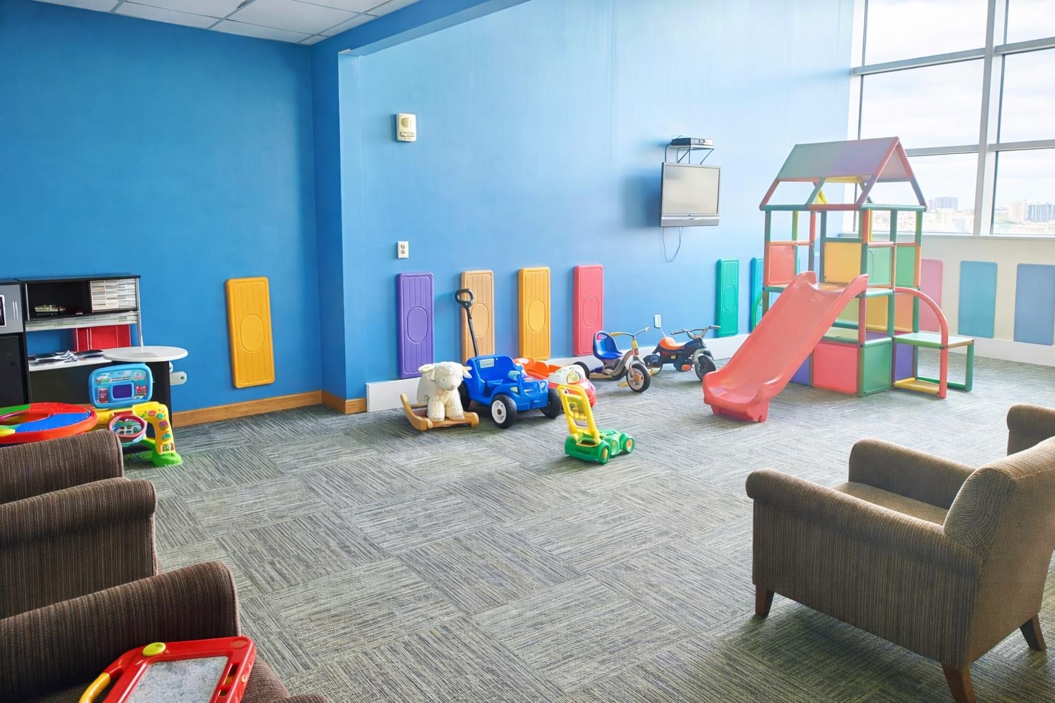 1 Shore Lane, Unit 1609 Jersey City, NJ 07310 - Photo 26 of 27 a bedroom with furniture and a couch