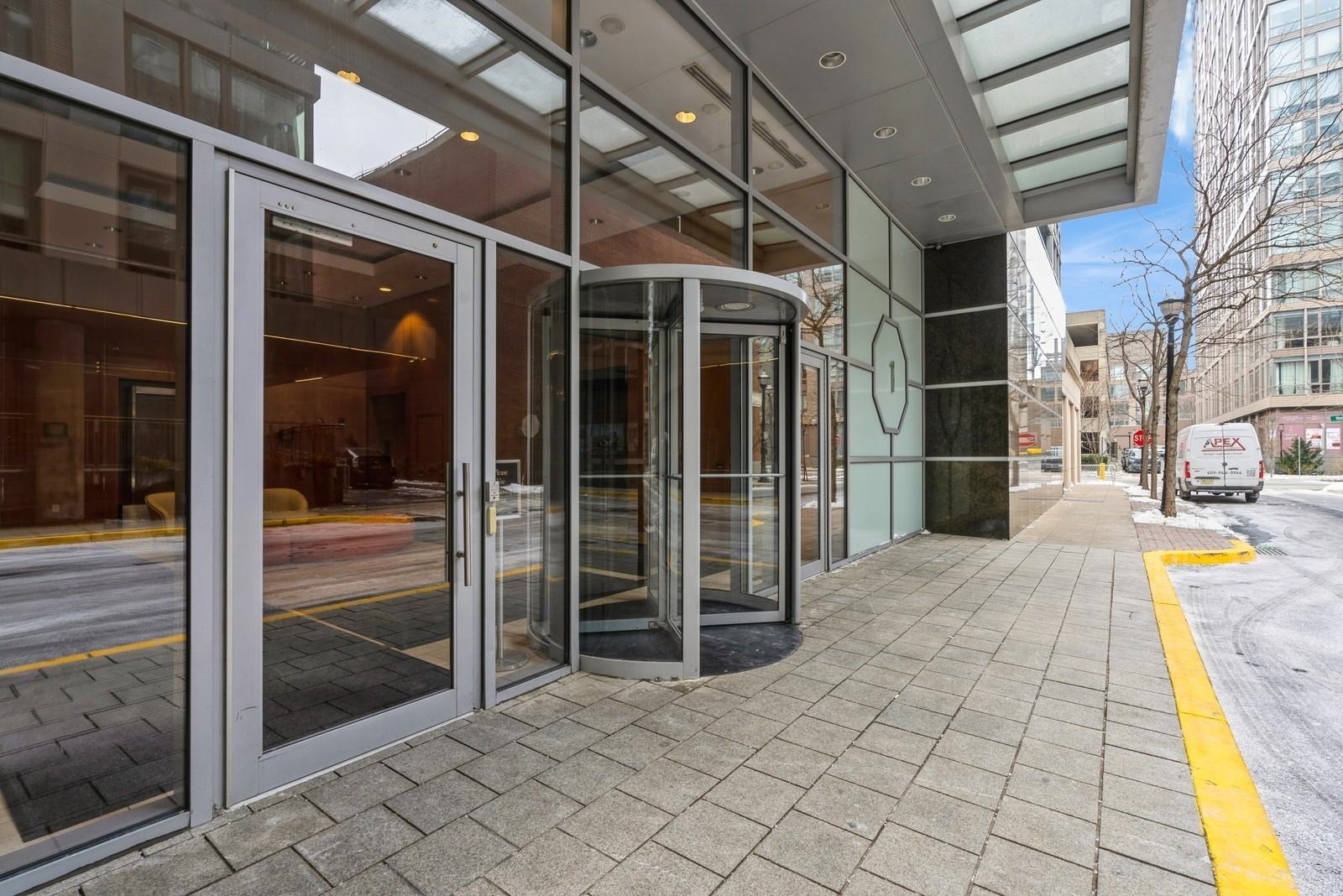 1 Shore Lane, Unit 1609 Jersey City, NJ 07310 - Photo 4 of 27 a view of a porch with a door