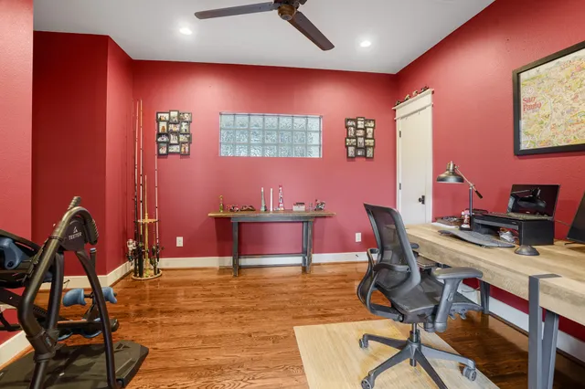 a workspace with furniture and screen