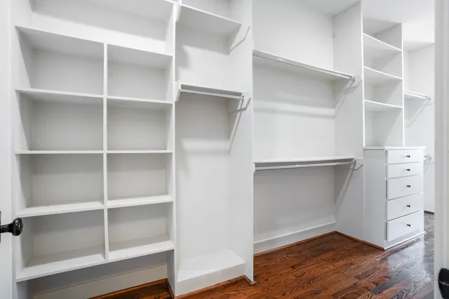 a view of an empty walk in closet