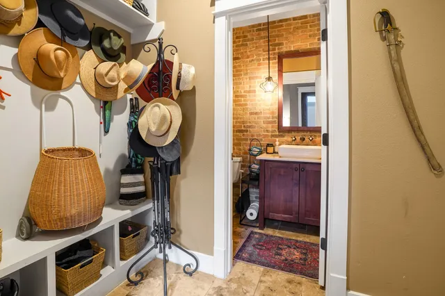 a view of hallway with wooden door