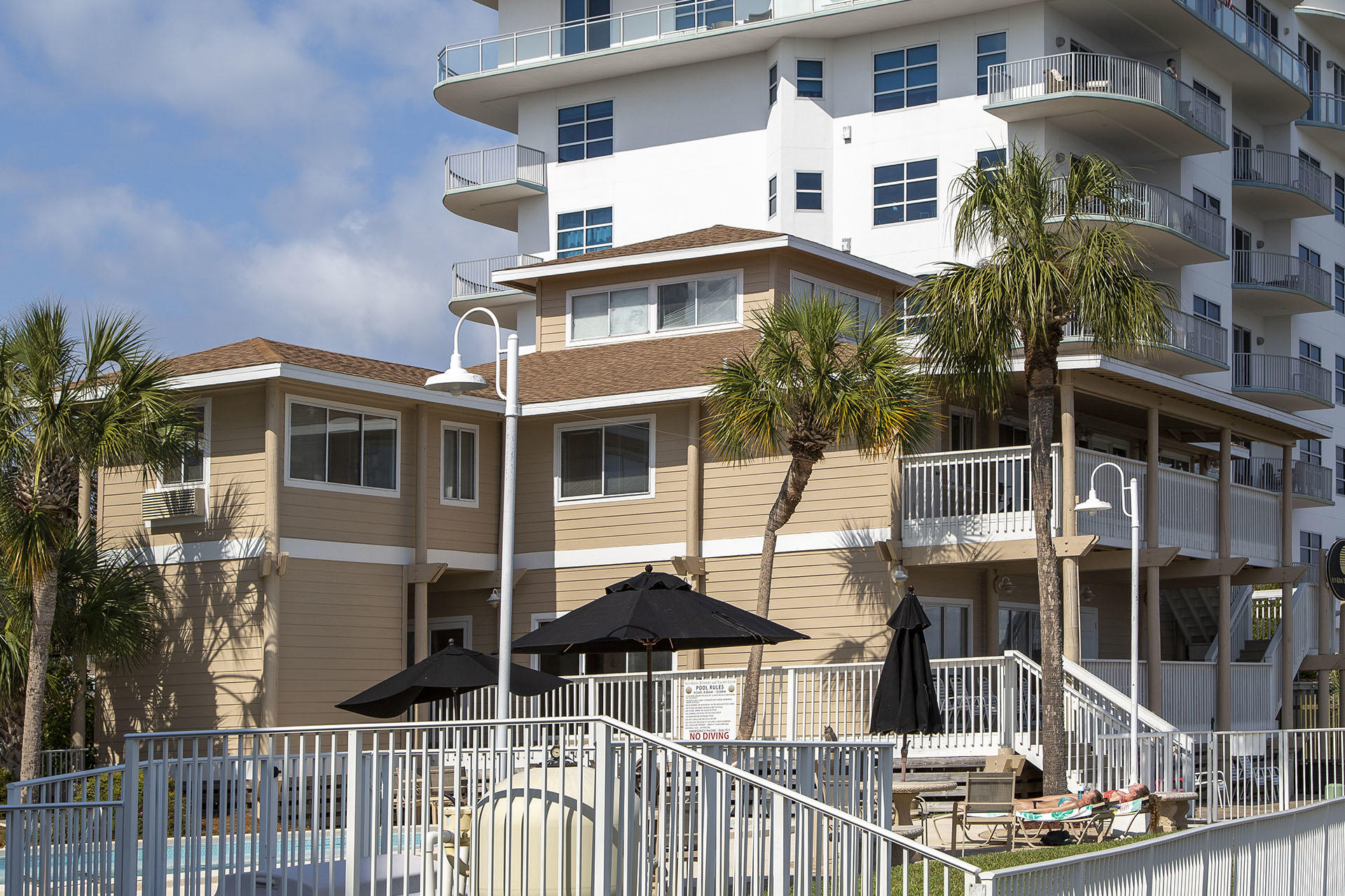 195 Durango Road, Unit 3D Destin, FL 32541 - Photo 13 of 22 a front view of a house with a yard