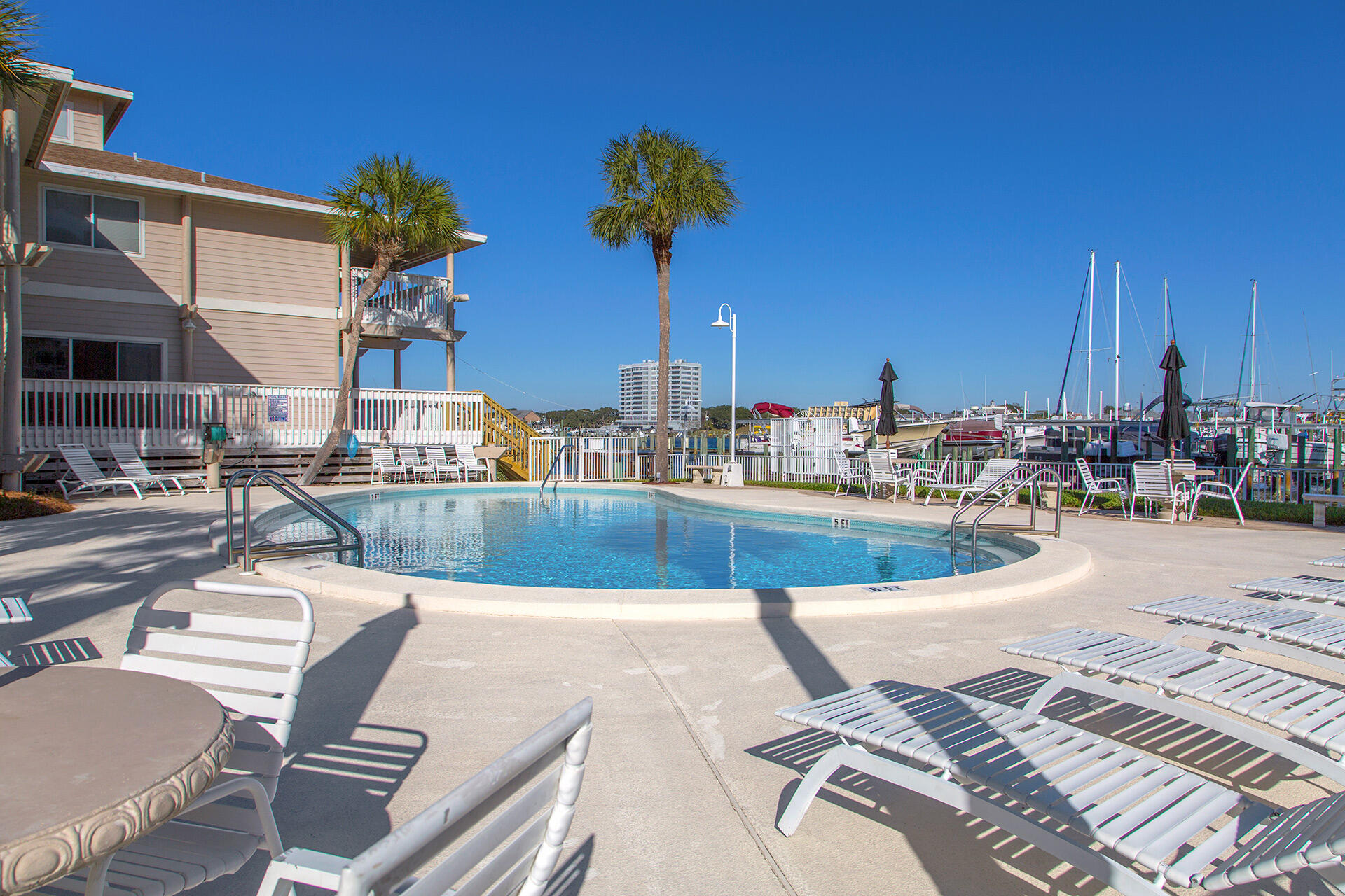 195 Durango Road, Unit 3D Destin, FL 32541 - Photo 14 of 22 a view of a swimming pool with a patio