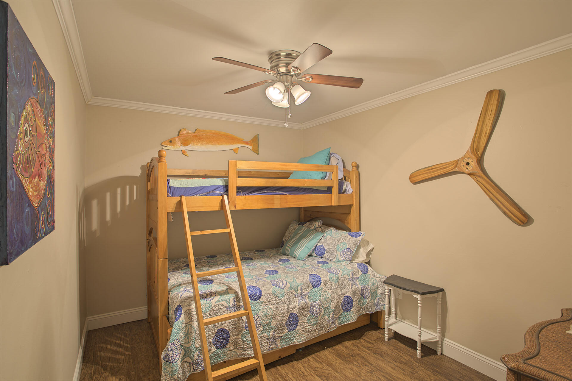 195 Durango Road, Unit 3D Destin, FL 32541 - Photo 7 of 22 a bedroom with a bed and a chandelier