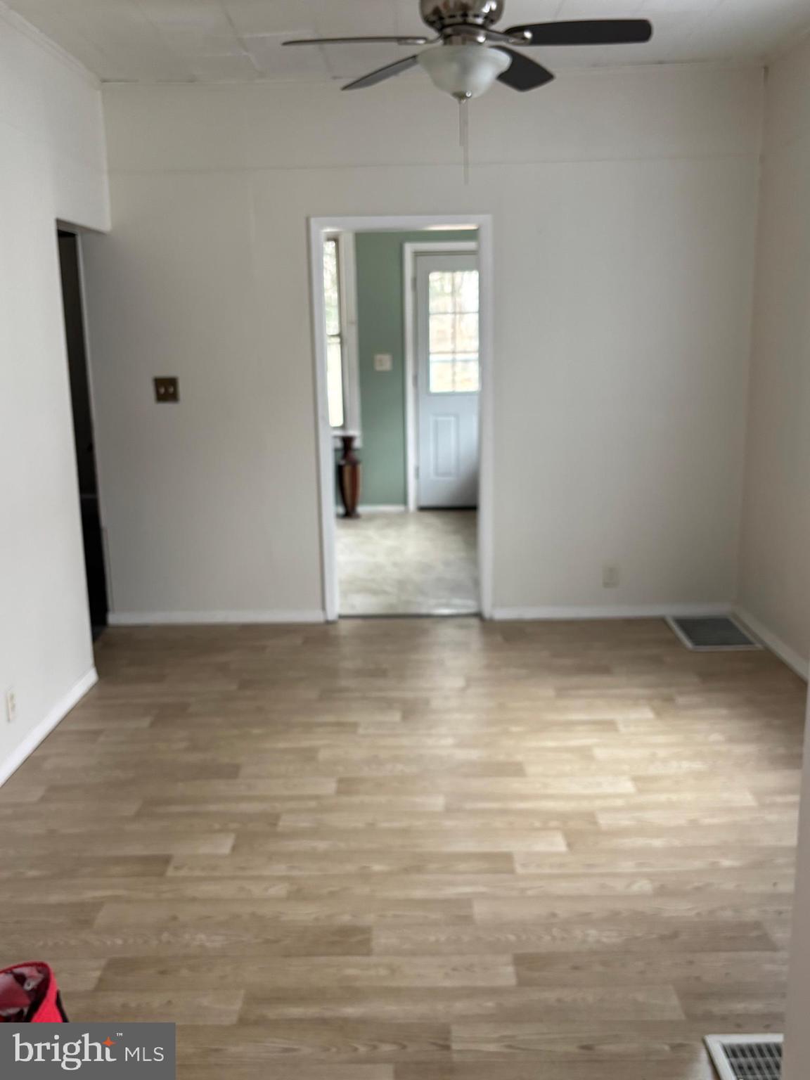 2 Blacks Terrace Paulsboro, NJ 08066 - Photo 6 of 24 a view of wooden floor and cabinet in a room