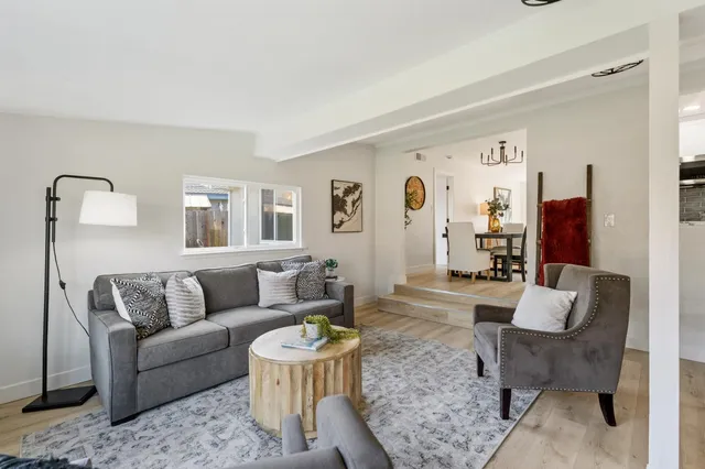 a living room with furniture and a couch