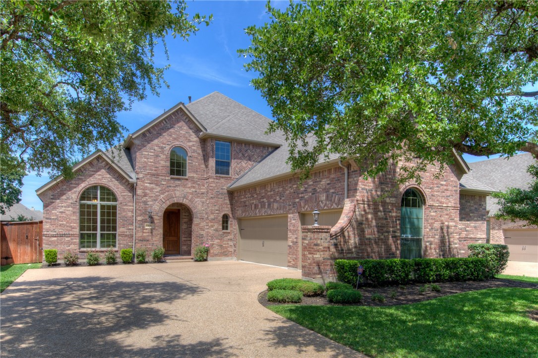 208 Angus Drive Cedar Park, TX 78613 - Photo 1 of 1 a front view of a house with a yard and garage