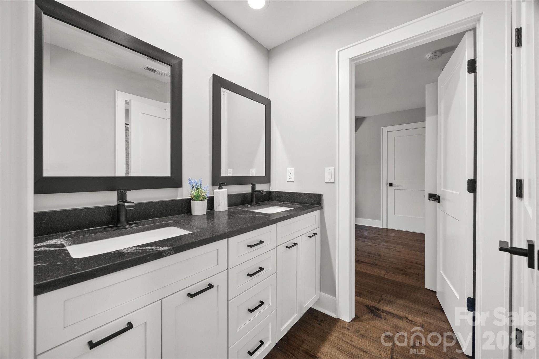 5438 Ralph Harper Lane Clover, SC 29710 - Photo 24 of 28 a bathroom with double sink and a mirror