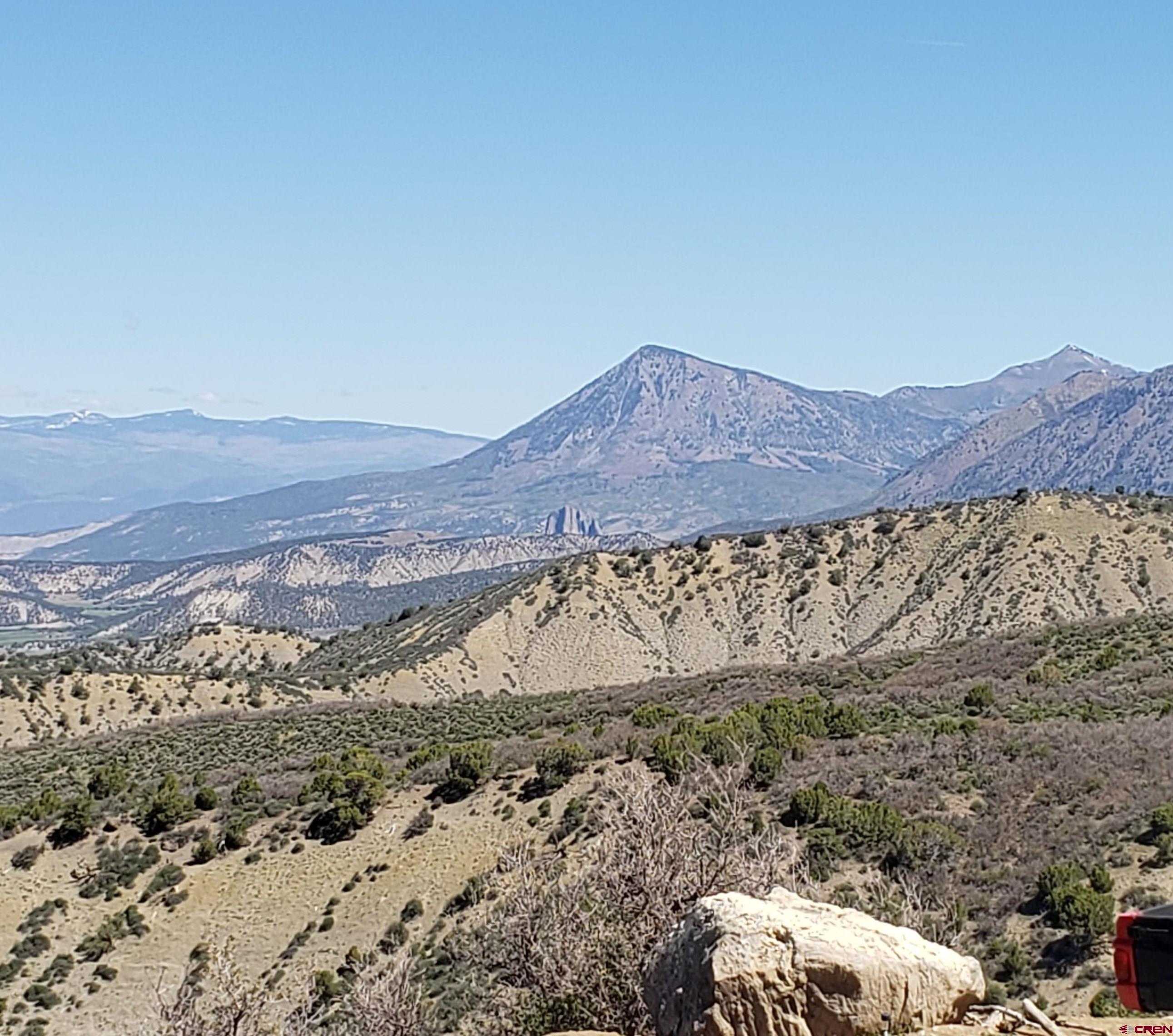 Tract 26 Cathedral Peak Ranch Crawford, CO 81415 - Photo 4 of 13 a view of a mountain with a field