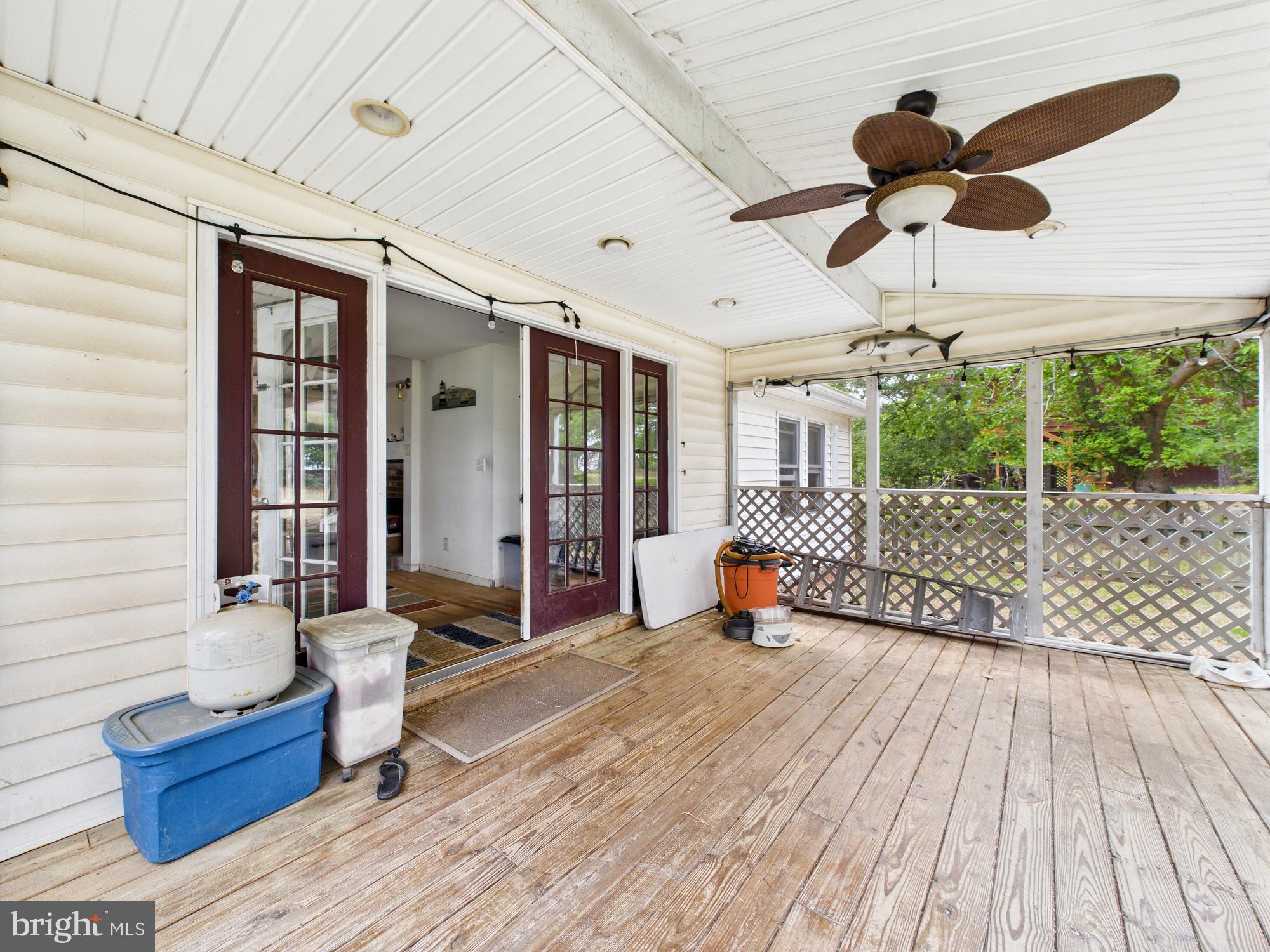 11161 Roland Parks Road Chance, MD 21821 - Photo 54 of 58 Side yard screened in porch
