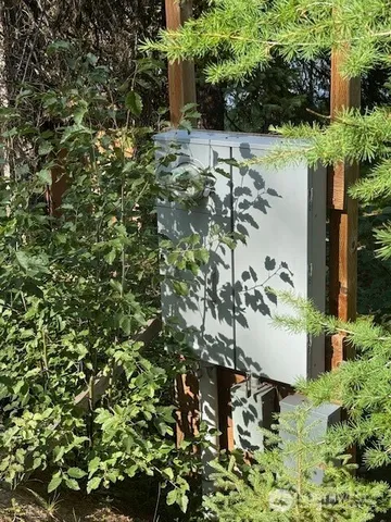 a view of a backyard of the house