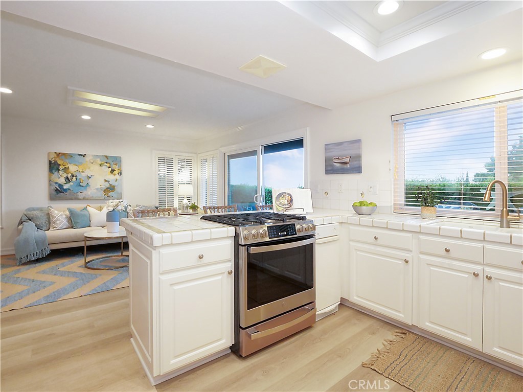 41 Oaktree Lane Rolling Hills Estates, CA 90274 - Photo 11 of 35 a kitchen with stainless steel appliances granite countertop a stove and a sink