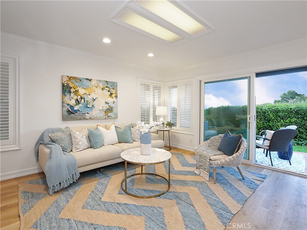 41 Oaktree Lane Rolling Hills Estates, CA 90274 - Photo 12 of 35 a living room with furniture and a large window