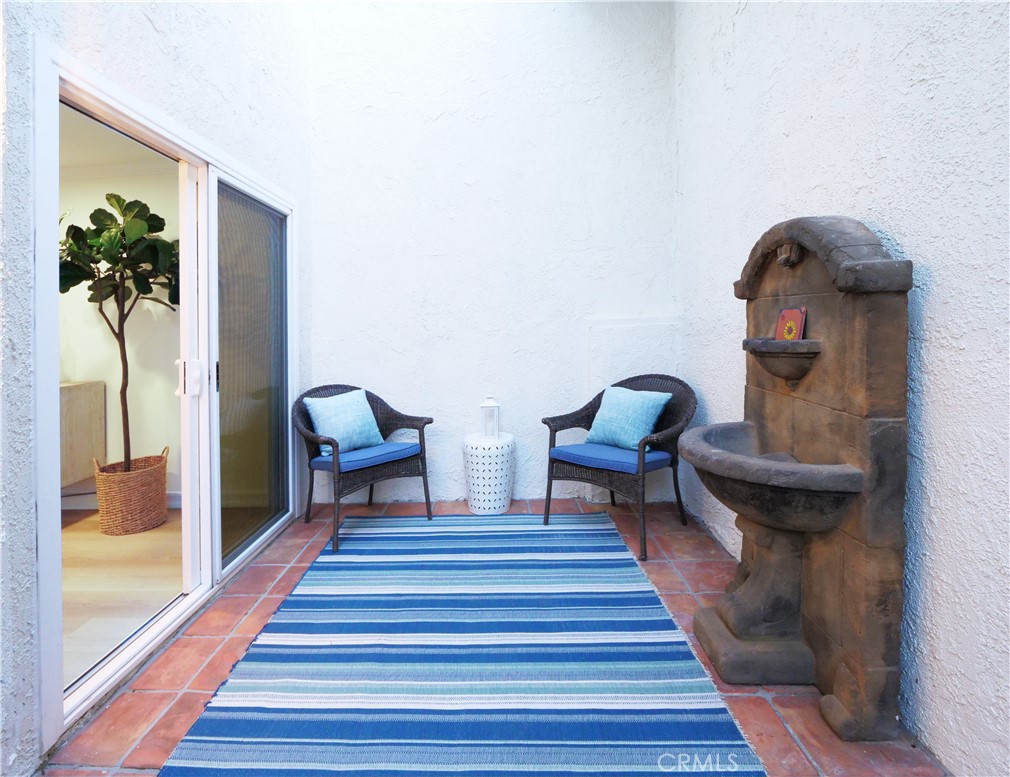 41 Oaktree Lane Rolling Hills Estates, CA 90274 - Photo 16 of 35 a living room with furniture and a wooden floor