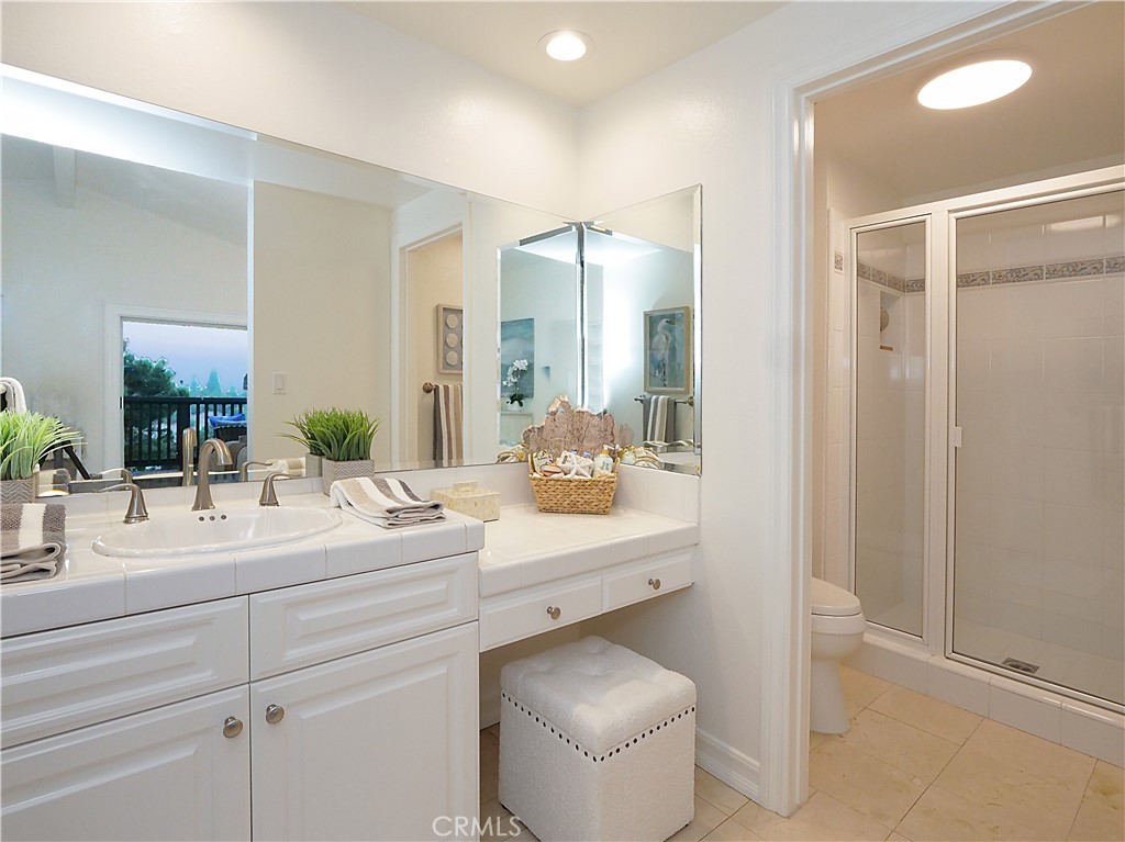 41 Oaktree Lane Rolling Hills Estates, CA 90274 - Photo 24 of 35 a bathroom with a sink toilet double vanity and shower