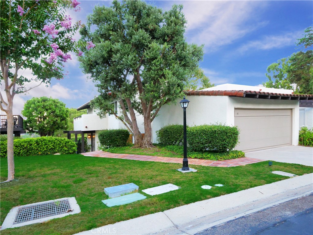 41 Oaktree Lane Rolling Hills Estates, CA 90274 - Photo 29 of 35 a view of a house with a yard and tree s