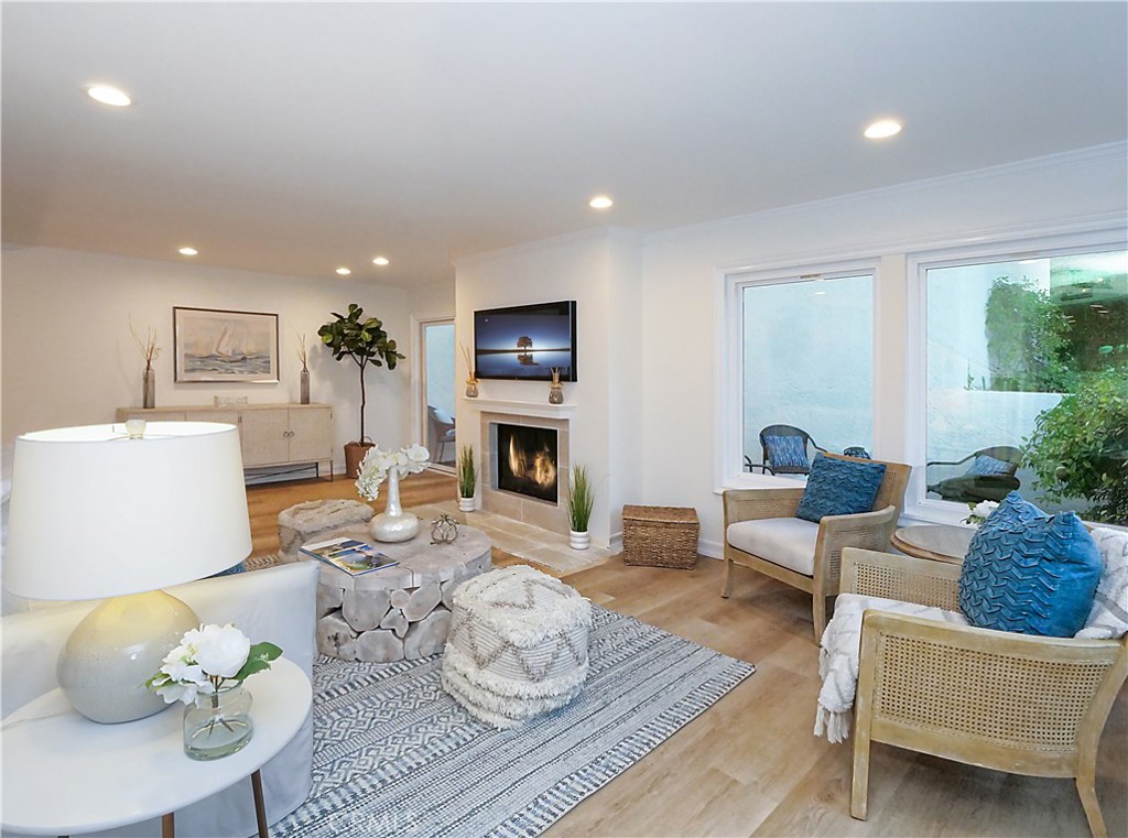 41 Oaktree Lane Rolling Hills Estates, CA 90274 - Photo 6 of 35 a living room with furniture and a fireplace