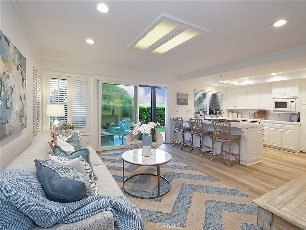 41 Oaktree Lane Rolling Hills Estates, CA 90274 - Photo 7 of 35 a living room with furniture and a large window