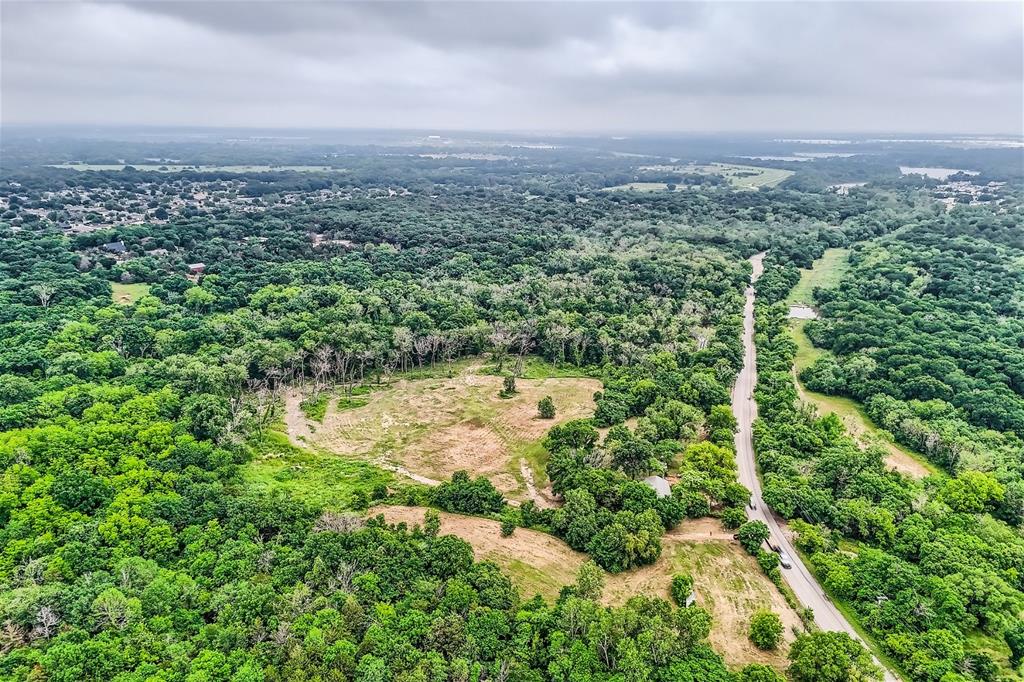 2320 Dowdy Ferry Road Dallas, TX 75217 - Photo 8 of 11 an aerial view of residential houses with outdoor space and trees