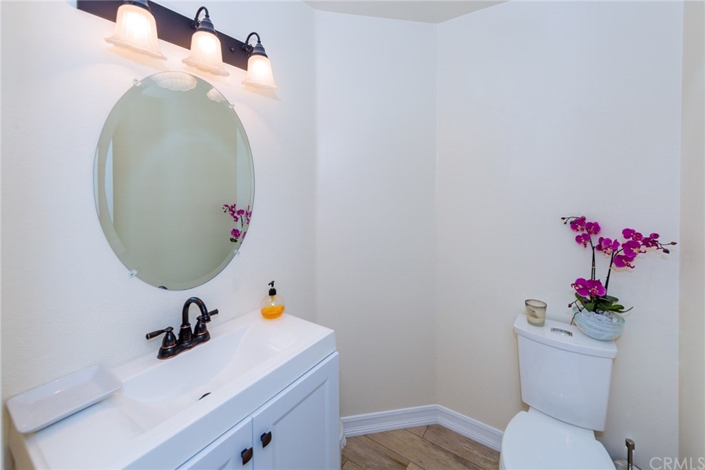 3834 Sky View Lane La Crescenta, CA 91214 - Photo 16 of 38 a bathroom with a sink mirror and toilet