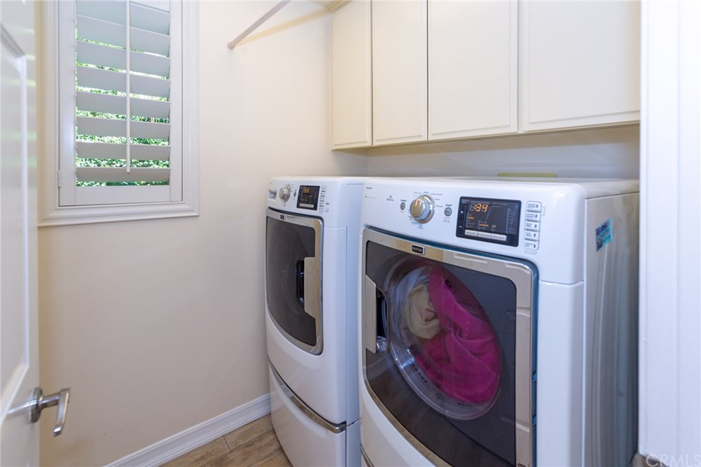 3834 Sky View Lane La Crescenta, CA 91214 - Photo 17 of 38 a utility room with dryer and washer