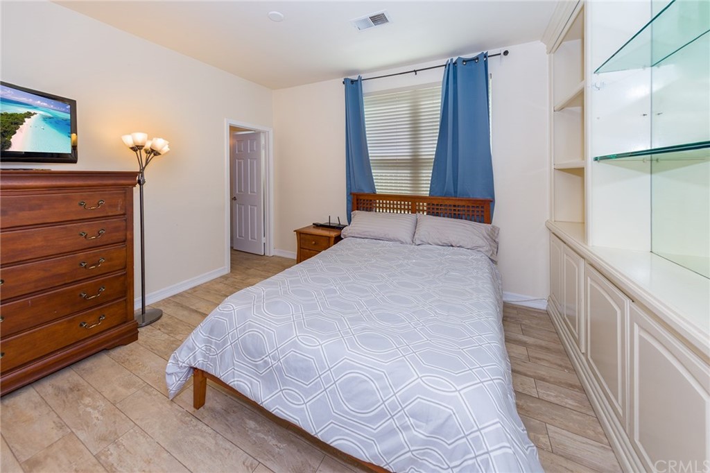 3834 Sky View Lane La Crescenta, CA 91214 - Photo 18 of 38 a bedroom with a bed and a dresser